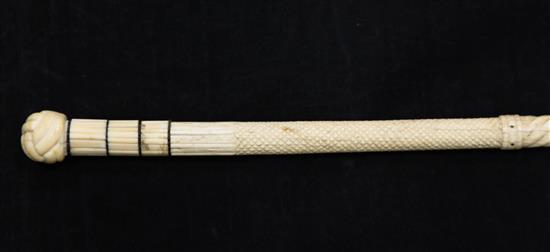 A 19th century scrimshaw carved whale bone and baleen walking cane, 39in.